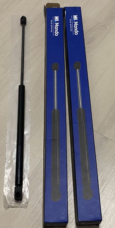 Амортизатор багажника - Mando - MOP045438